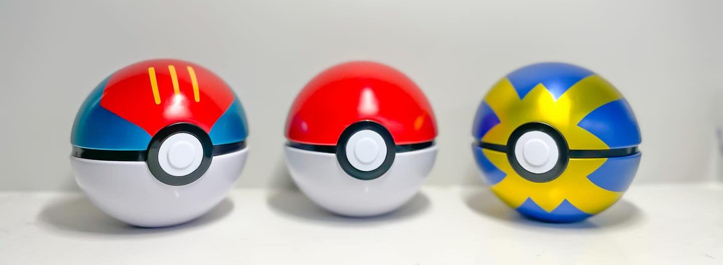 Three Pokeballs on a white background